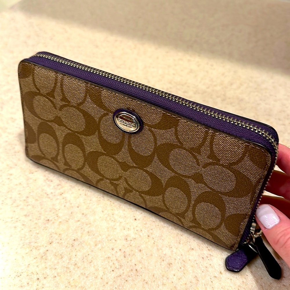 Coach wallet/clutch, tan Cs with purple trim & interior, great condition
